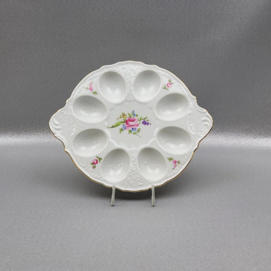 The porcelain egg serving tray, Bernadotte by Thun. Diameter 25 cm.