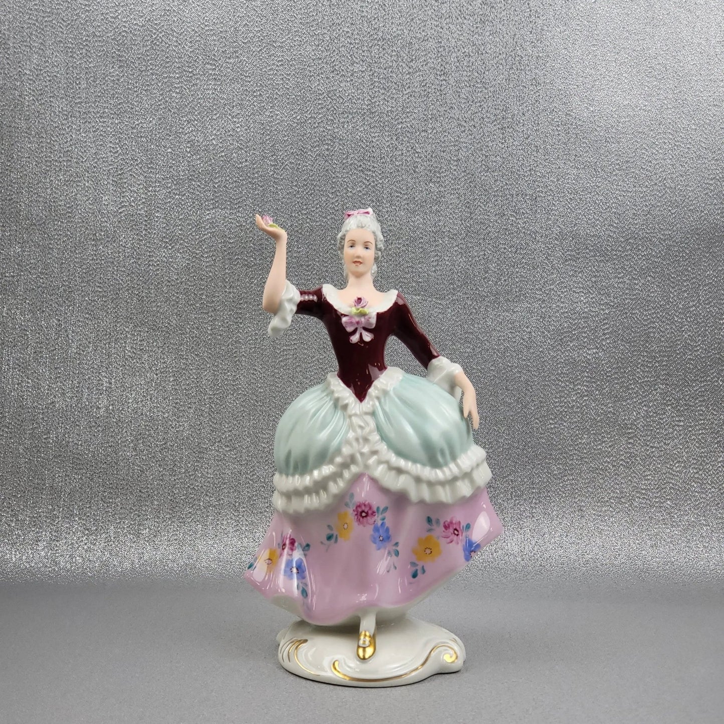 Porcelain figurine "Rococo lady" by Royal Dux Bohemia.