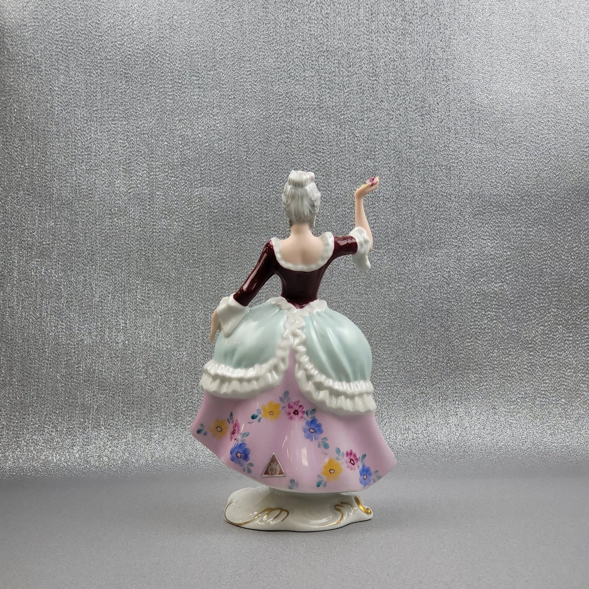 Porcelain figurine "Rococo lady" by Royal Dux Bohemia.