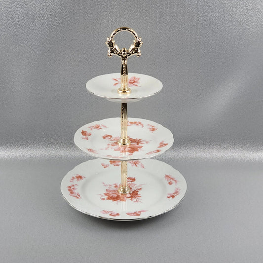 The porcelain 3-tier serving platter, Bernadotte by Thun 1794 a.s.. Diameter 14/19/25 cm.